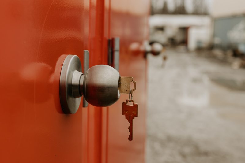 Secure locking mechanism on a portable restroom unit